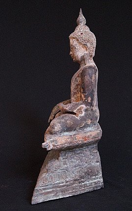 Shan Buddha statue in bronze, left side profile view showing seated posture and base