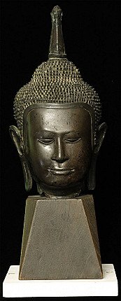Thai bronze Buddha head from the Utong-B period (14th century), frontal view on wooden base