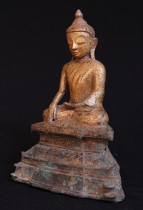 Burmese Ava period Buddha statue in bronze, three-quarter view showing the lowered right hand and base