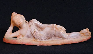 Reclining Buddha statue in marble from Burma (Myanmar), 19th century Mandalay period, side view