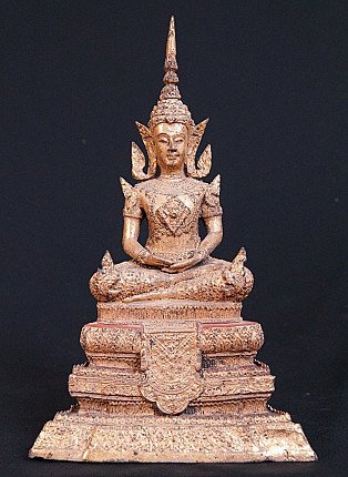 Thai bronze Buddha statue seated in dhyana mudra, full front view on tiered base