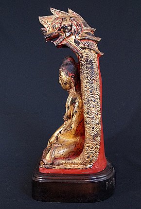 Shan Naga Buddha statue in lacquerware, left side profile with raised naga hood