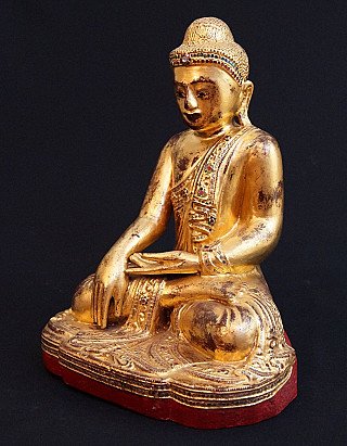 Mandalay Buddha statue from Myanmar, seated in bhumisparsha mudra, three-quarter left view