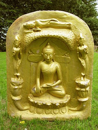 Wooden Buddha relief plaque from Burma (Myanmar) with seated Buddha and two attendants, front view